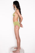 Load image into Gallery viewer, Model wearing Ataya Pleated Triangle Top in Green Leaf