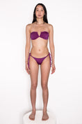 Load image into Gallery viewer, Model wearing Ataya Reversible Tie Side Pant in Emerald / Grape