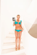 Load image into Gallery viewer, Model wearing All Around Adjustable Top in Teal