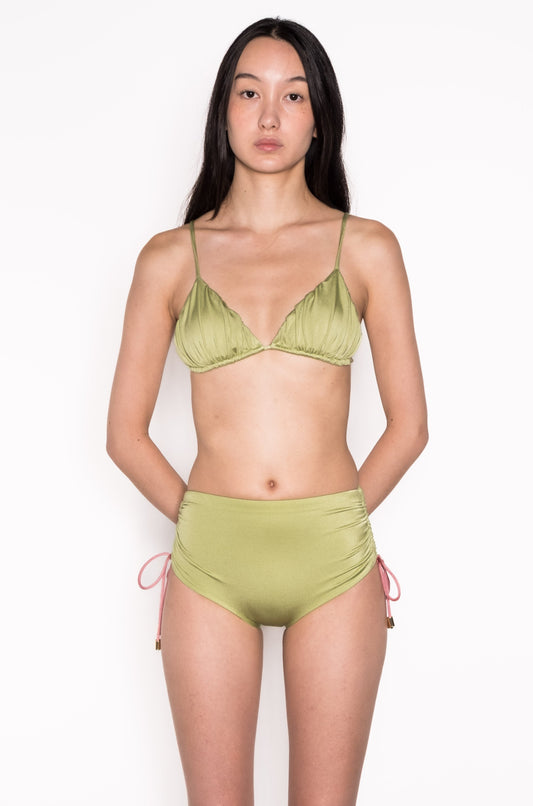 Model wearing Ataya Pleated Triangle Top in Green Leaf