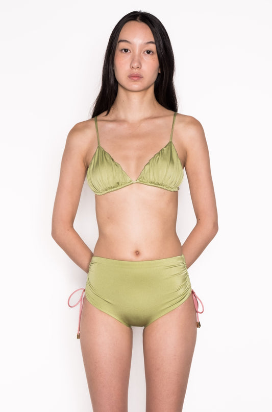 Model wearing Side Ruched High Waist Pant in Green Leaf