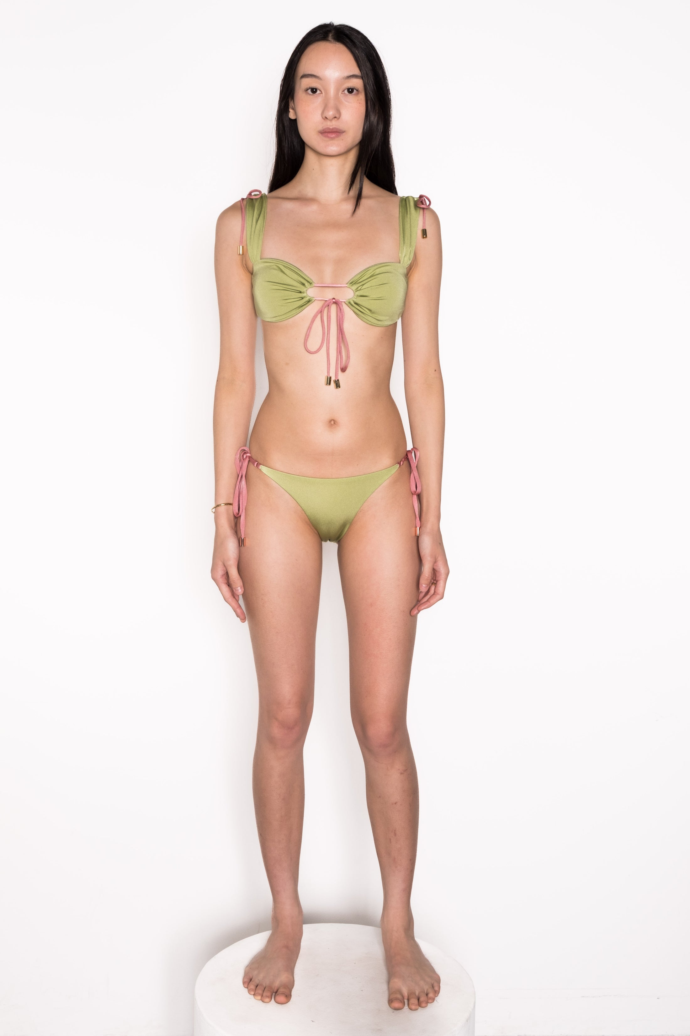 Model wearing Ataya Reversible Tie Side Pant in Green Leaf / Dusty Rose