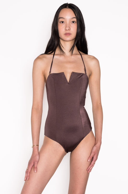Model wearing V Wired Bandeau One Piece Swimsuit in Espresso