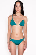 Load image into Gallery viewer, Model wearing Ataya Loop Side Hipster Pant in Emerald
