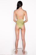 Load image into Gallery viewer, Model wearing Ataya Low V Neck One Piece Swimsuit  in Green Leaf
