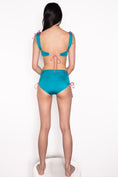 Load image into Gallery viewer, Model wearing All Around Adjustable Top in Teal
