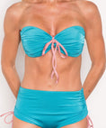 Load image into Gallery viewer, Close up of larger busted model wearing Contrast Twist Bandeau in Teal standing front on with white background
