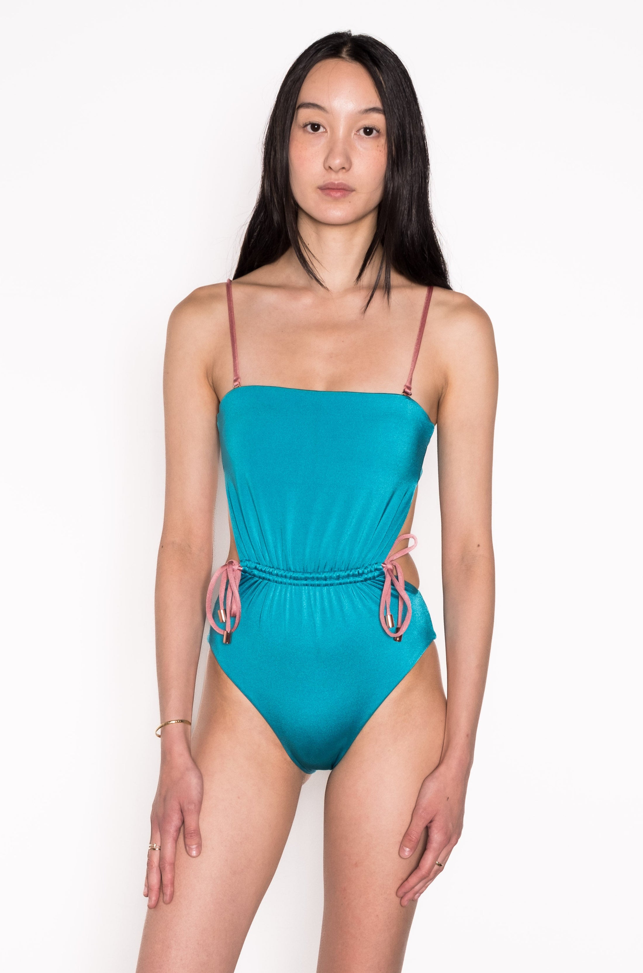 Model wearing Bandeau Adjustable Monokini One Piece Swimsuit in Teal
